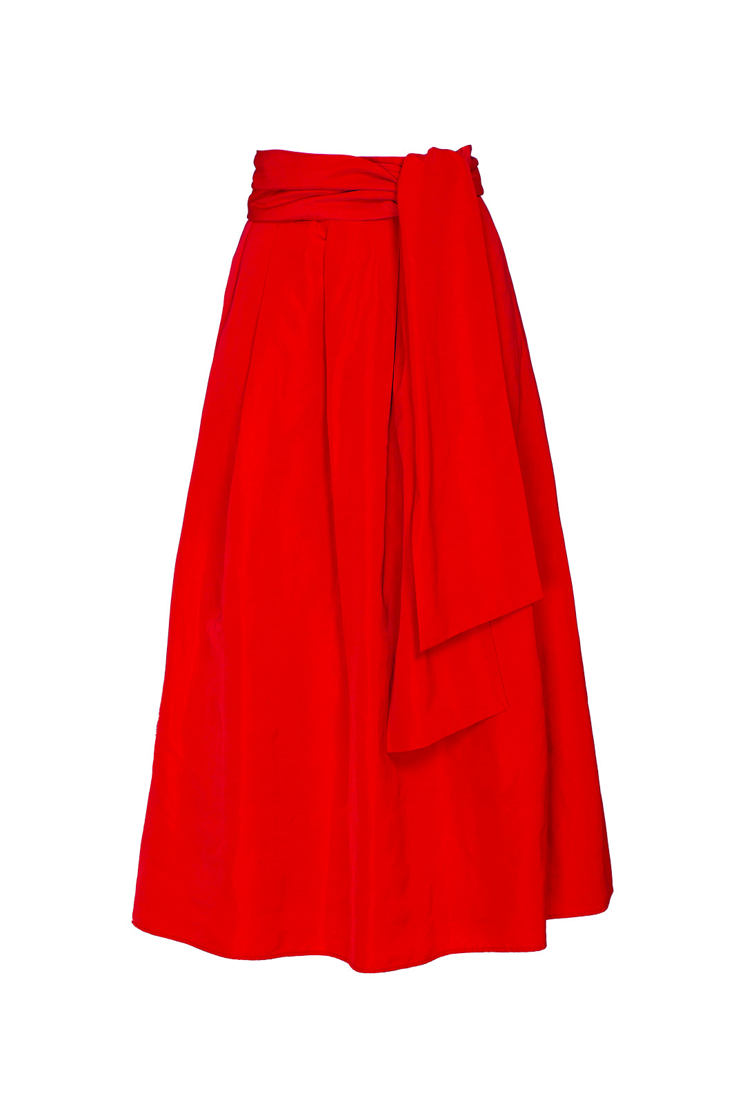 Falda midi roja estructurada con volumen teatral, corte evasé y gran lazo sastre lateral. Alta costura, exclusividad y diseño artesanal hecho en España.
