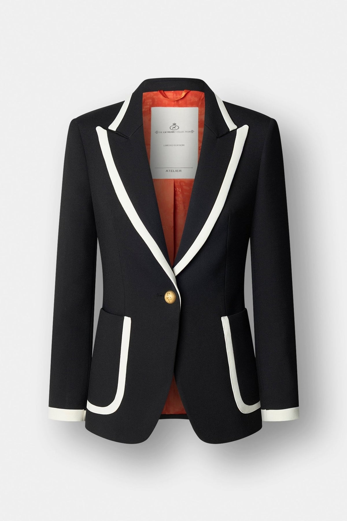 Blazer negra con ribetes en contraste Laurent de The Extreme Collection en elegante color negro con ribetes blancos y botones dorados.